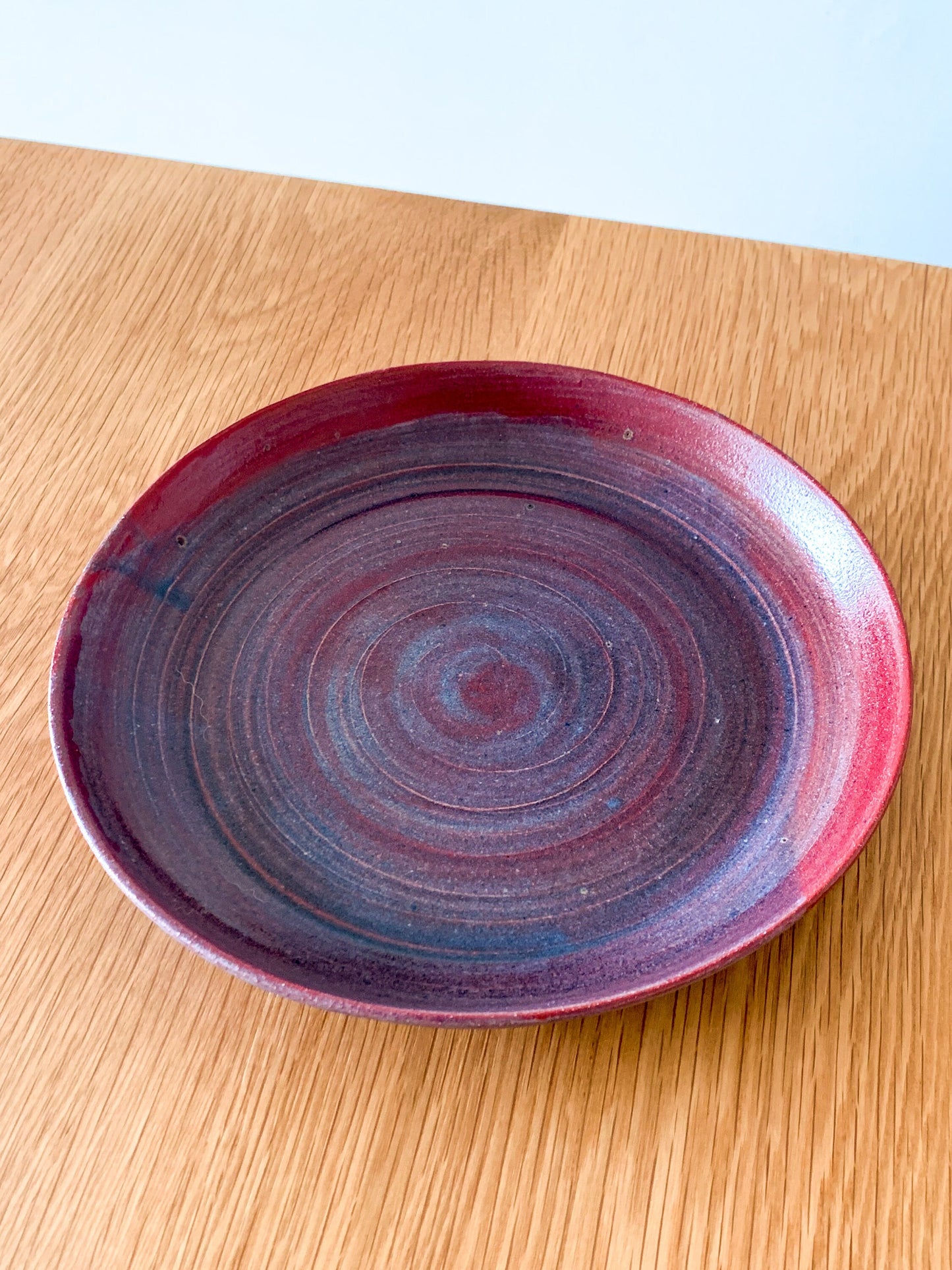 Pottery plate in Purple Red and Blue Matt Glaze