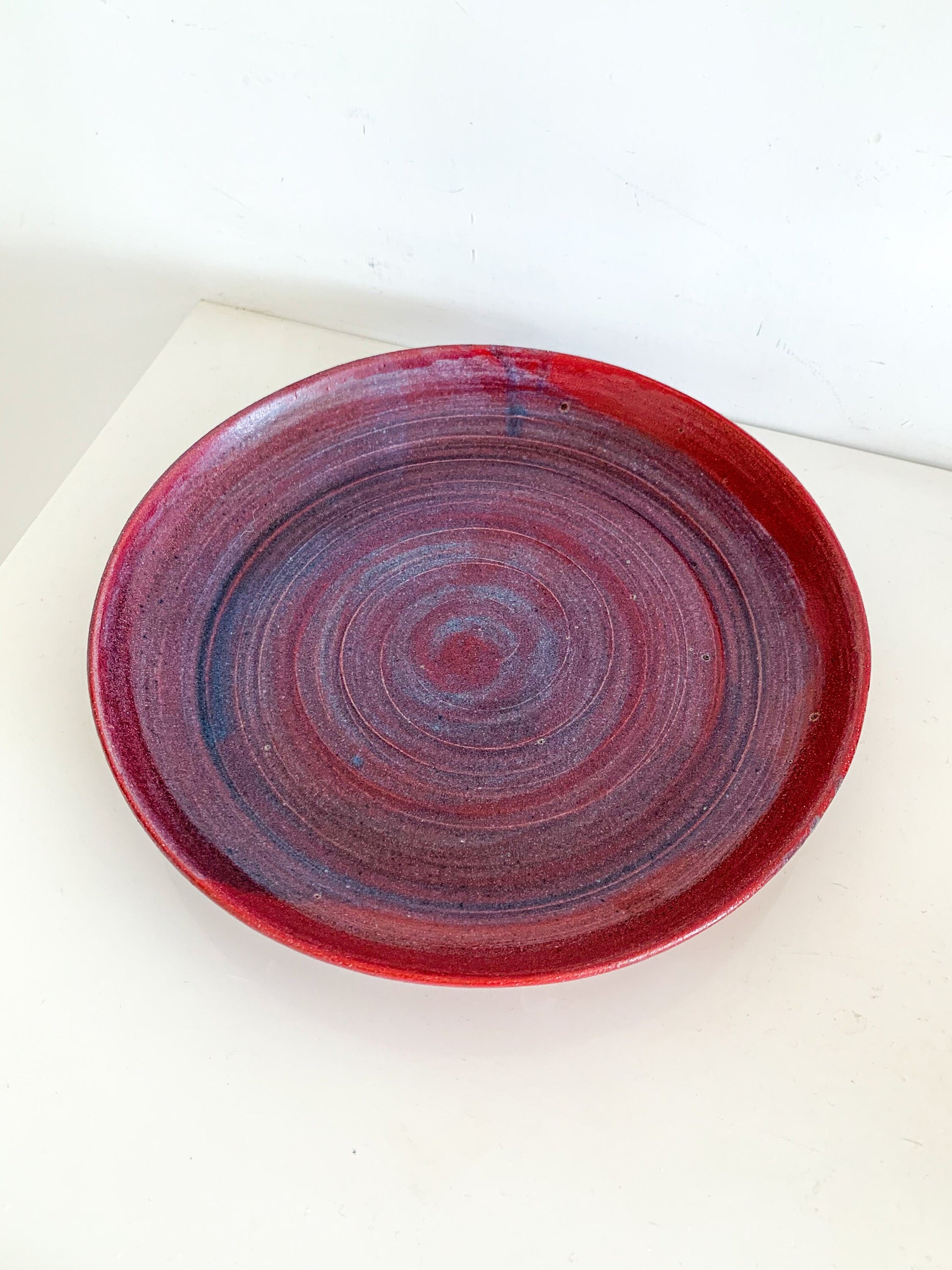 Pottery plate in Purple Red and Blue Matt Glaze